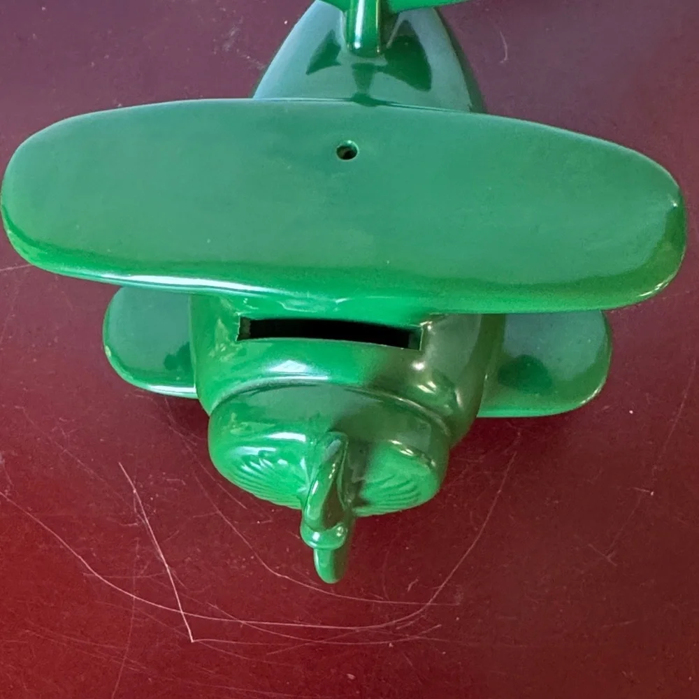 Vintage Green piggy bank Airplane